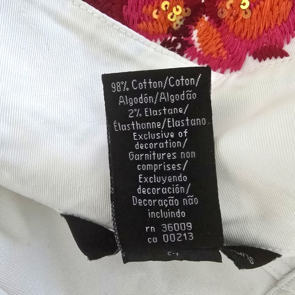 Calvin Klein Jeans White Jean Jacket with Pink Floral Design On The Back - Picture 12 of 13